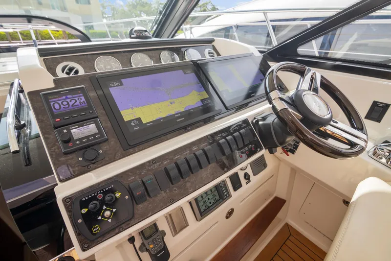  Yacht Photos Pics 2013 Sea Ray 410 Sundancer helm with advanced navigation and control systems.