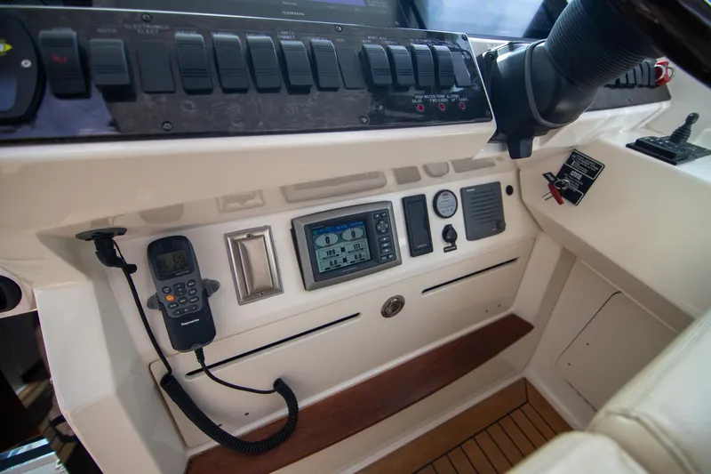  Yacht Photos Pics Control panel of 2013 Sea Ray 410 Sundancer boat with navigation and communication equipment.