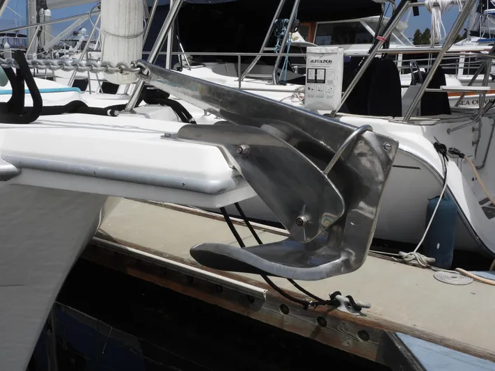  Yacht Photos Pics Anchor on a 1998 Riviera Convertible yacht docked at a marina.