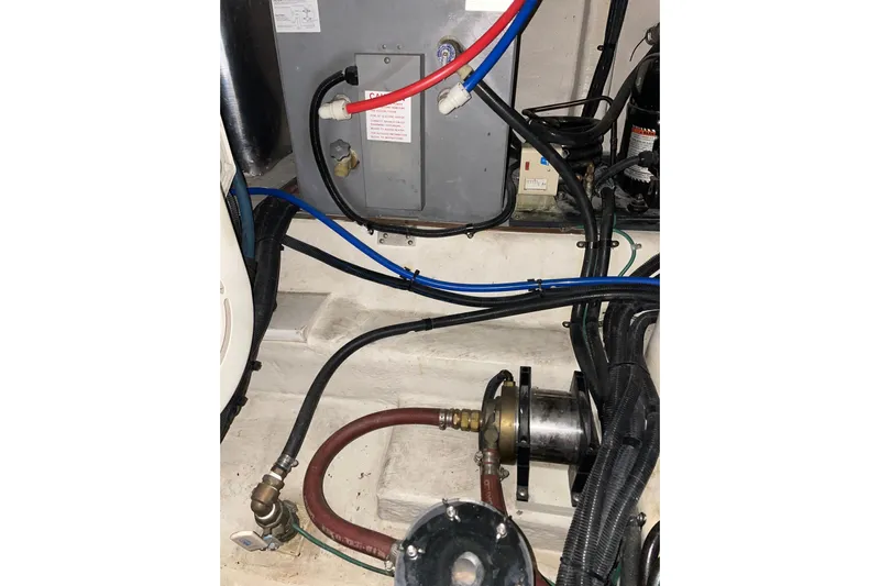  Yacht Photos Pics Engine compartment of 2002 Riviera 34 Convertible with visible wiring and components.