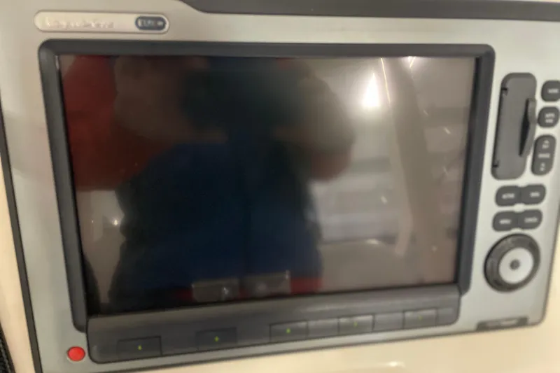  Yacht Photos Pics Close-up of a 2002 Riviera 34 Convertible boat control panel display.