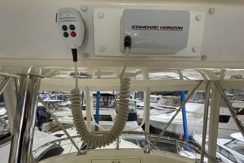  Yacht Photos Pics Interior view of a 2002 Riviera 34 Convertible boat with Standard Horizon radio equipment.