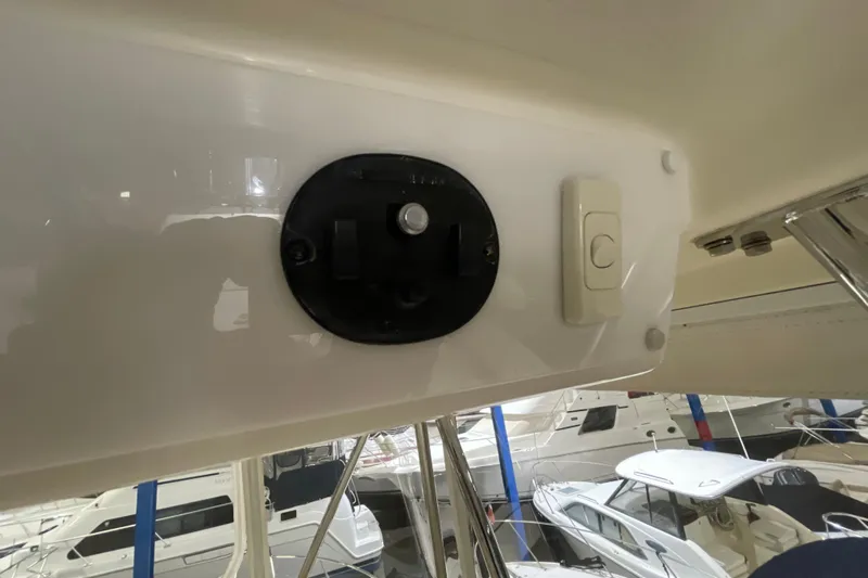  Yacht Photos Pics Interior view of a 2002 Riviera 34 Convertible yacht, featuring a control panel.