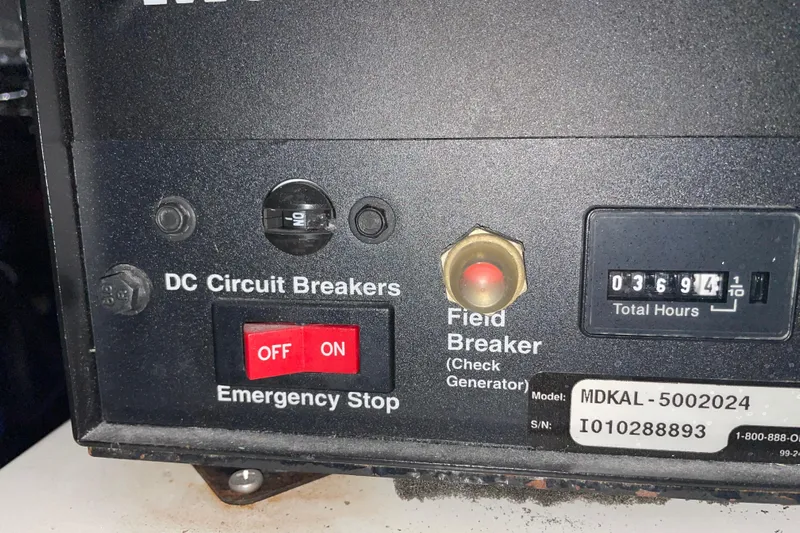  Yacht Photos Pics Control panel of a 2002 Riviera 34 Convertible with circuit breakers and hour meter.