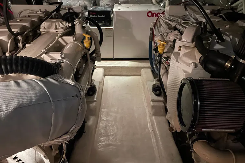  Yacht Photos Pics Engine room of 2002 Riviera 34 Convertible with Onan Marine GenSet.