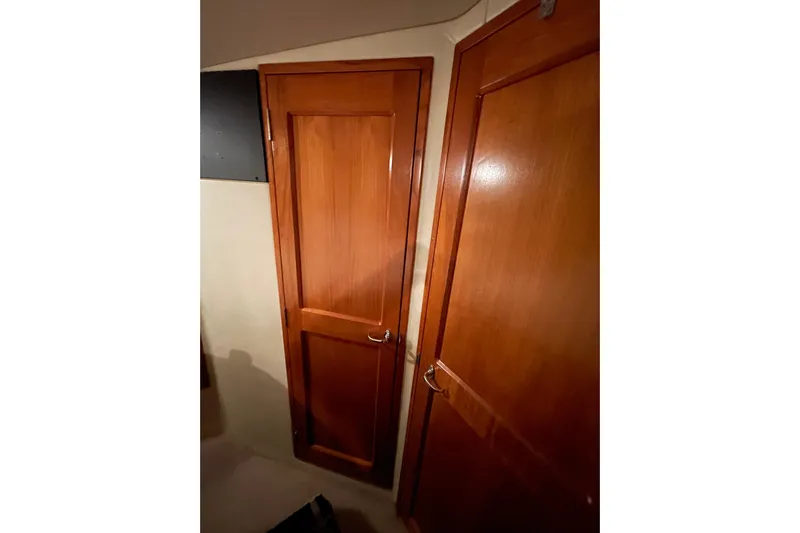  Yacht Photos Pics Wooden interior doors on a 2002 Riviera 34 Convertible yacht.