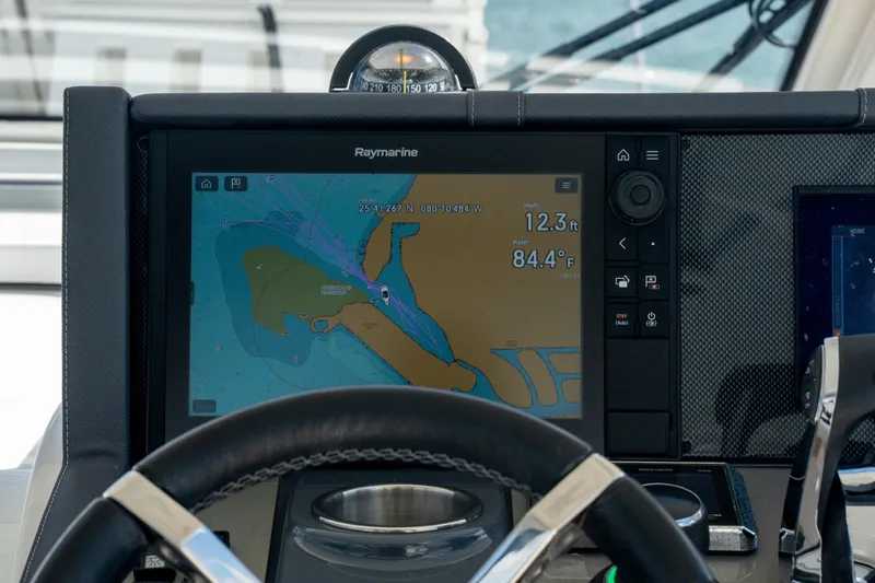  Yacht Photos Pics Raymarine navigation display on 2018 Cruisers Yachts 390 Express Coupe dashboard.
