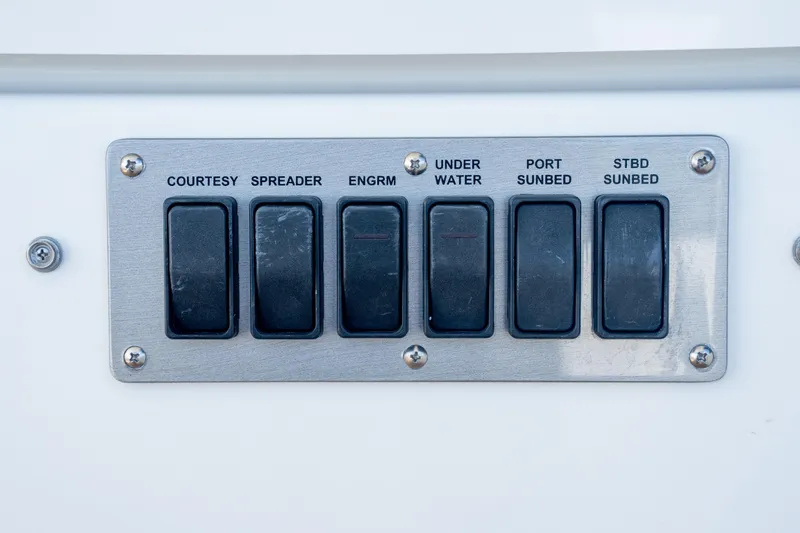  Yacht Photos Pics Control panel on 2018 Cruisers Yachts 390 Express Coupe with labeled switches.