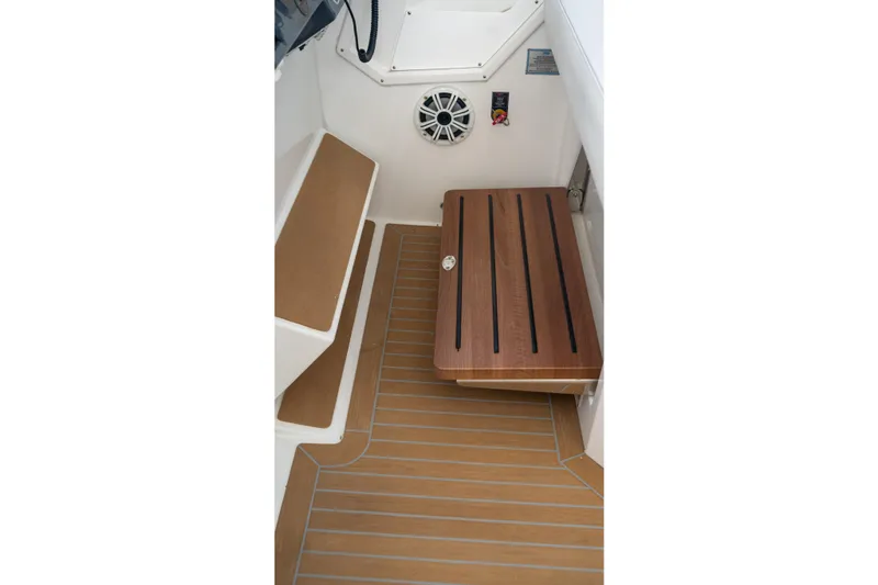  Yacht Photos Pics 2018 Cruisers Yachts 390 Express Coupe interior with wooden flooring and seating.