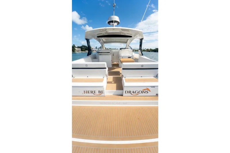  Yacht Photos Pics 2018 Cruisers Yachts 390 Express Coupe, spacious deck, sunny day, waterfront view.