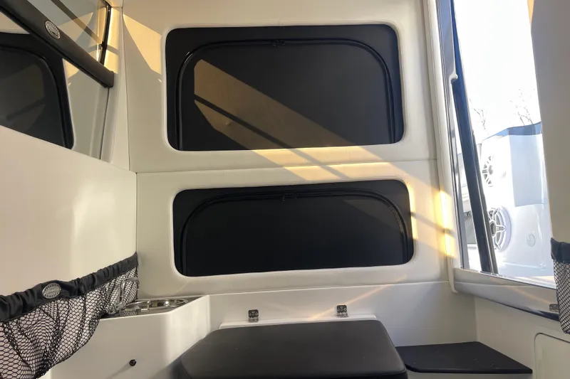  Yacht Photos Pics Interior of 2026 Nor- 390 Sport boat with seating and storage compartments.