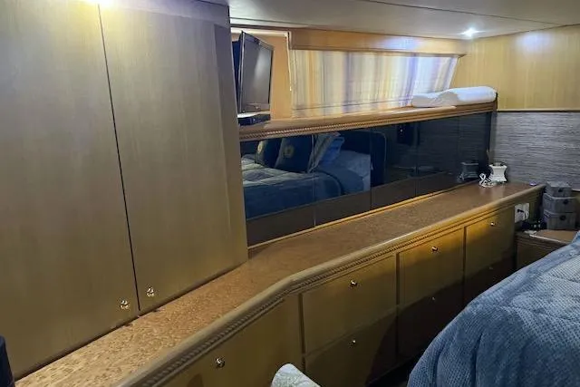 "robyn Faye" Yacht Photos Pics Luxurious interior of a 1996 Forbes Cooper pilot house yacht with wood cabinetry.