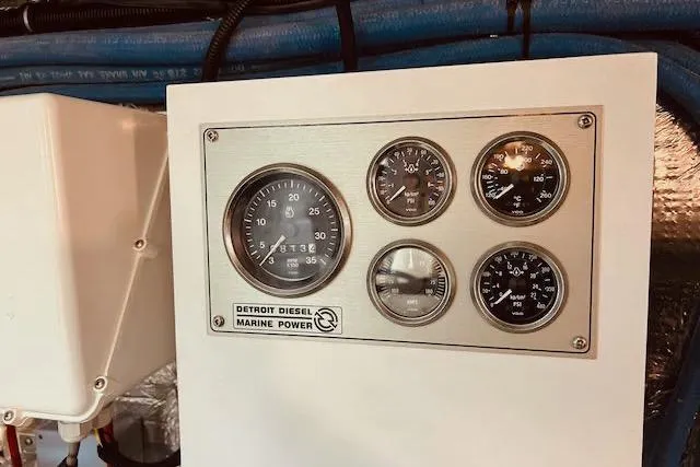 "robyn Faye" Yacht Photos Pics Instrument panel of a 1996 Forbes Cooper pilot house with Detroit Diesel Marine Power gauges.