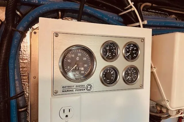 "robyn Faye" Yacht Photos Pics Control panel of a 1996 Forbes Cooper pilot house with Detroit Diesel marine power gauges.