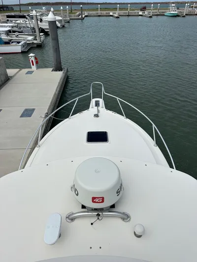  Yacht Photos Pics 2006 Albemarle 320 Express Fisherman docked at a marina.