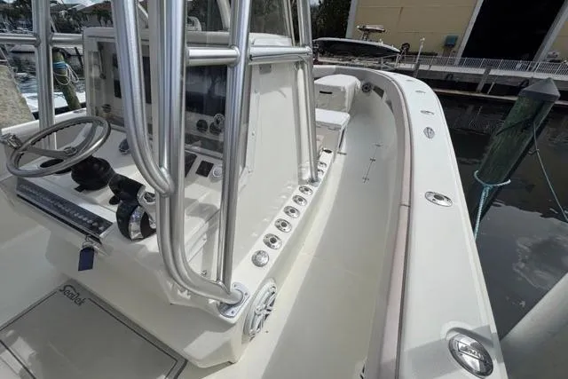  Yacht Photos Pics 2016 SeaVee 34 boat interior with steering console and rod holders.