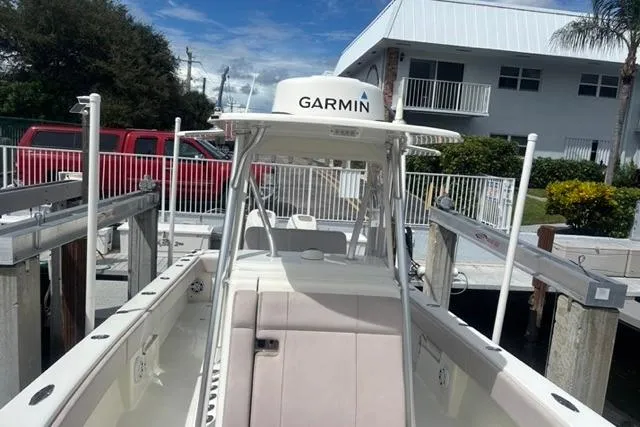  Yacht Photos Pics 2016 SeaVee 34 boat with Garmin equipment docked near a residential area.