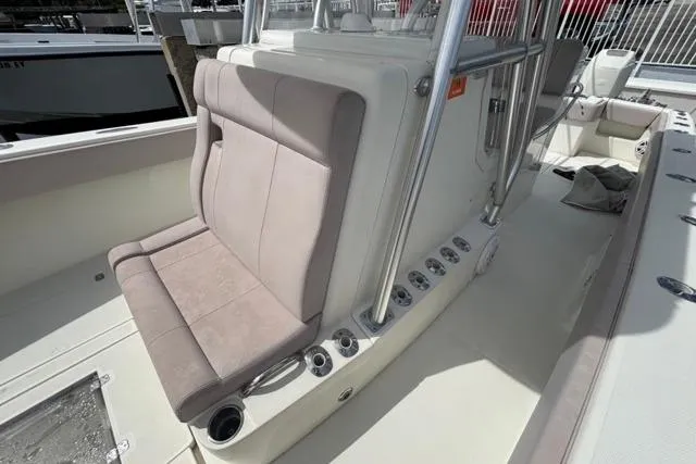  Yacht Photos Pics 2016 SeaVee 34 boat interior with cushioned seating and rod holders.