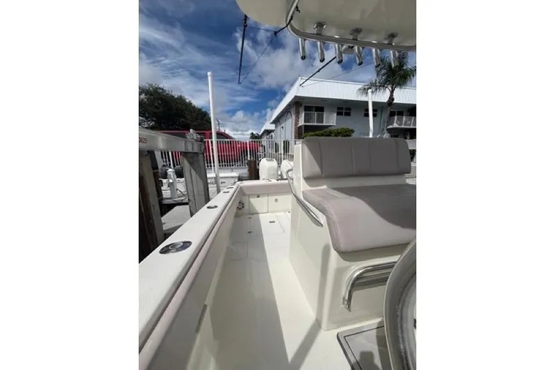  Yacht Photos Pics 2016 SeaVee 34 boat interior with seating, under a clear blue sky.