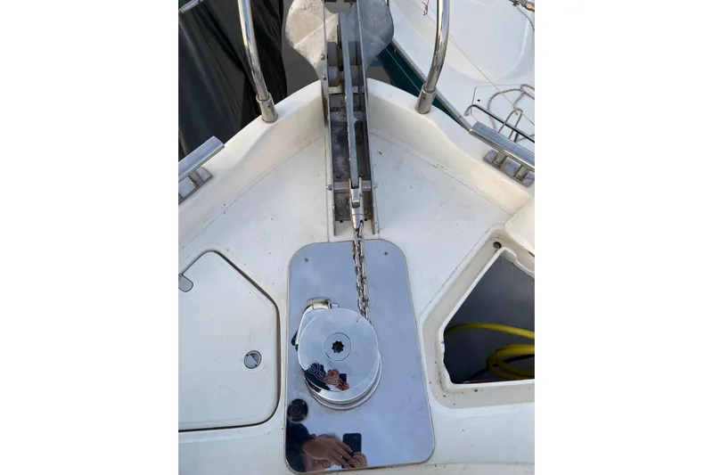  Yacht Photos Pics Anchor winch on 2006 Aicon 56 yacht deck, featuring stainless steel fittings.