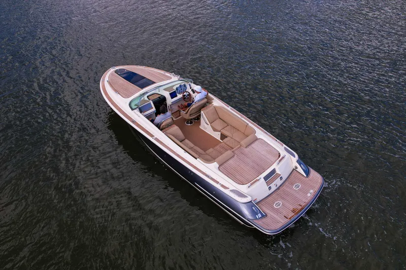  Yacht Photos Pics 2017 Chris-Craft Corsair 28 Heritage Edition cruising on open water.