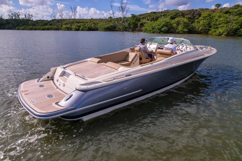  Yacht Photos Pics 2017 Chris-Craft Corsair 28 Heritage Edition cruising on a serene lake.
