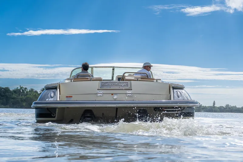  Yacht Photos Pics 2017 Chris-Craft Corsair 28 Heritage Edition cruising on a sunny day.