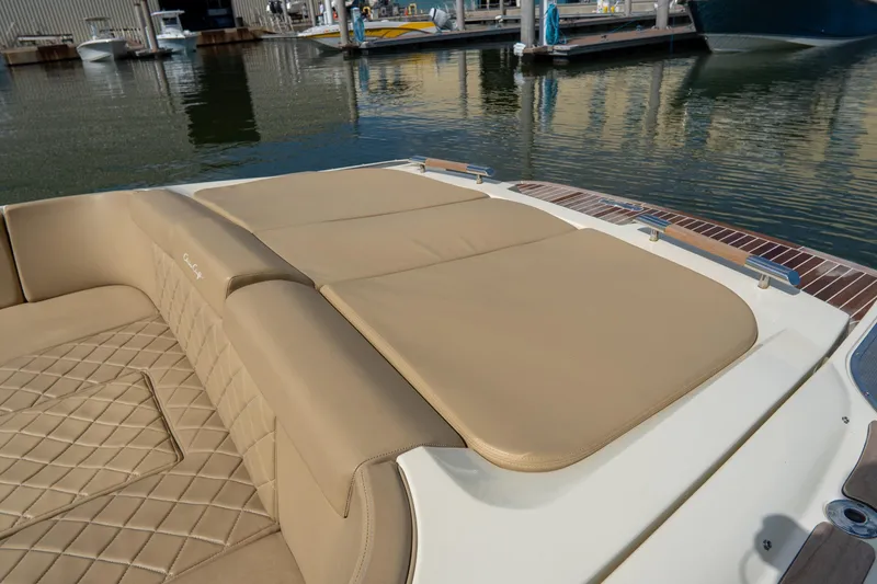  Yacht Photos Pics 2017 Chris-Craft Corsair 28 Heritage Edition with tan leather seating, docked by the water.