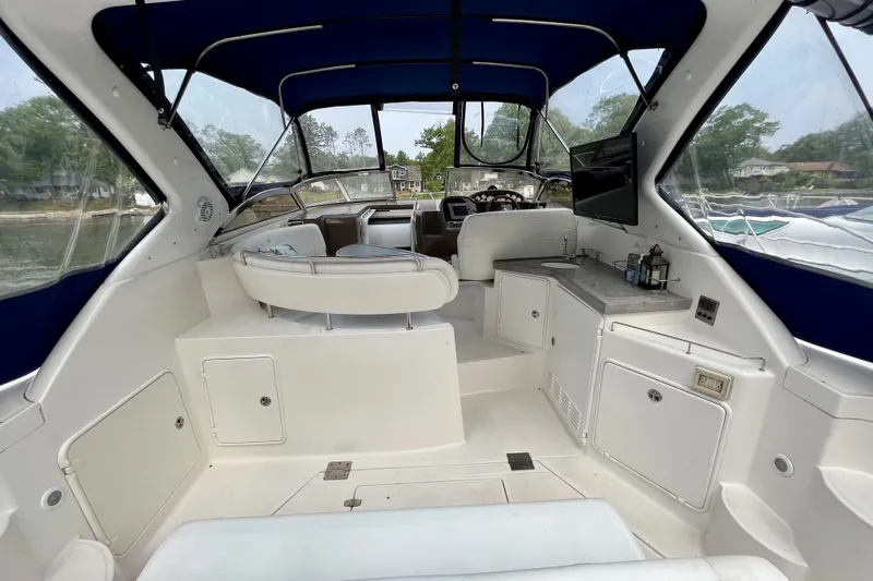  Yacht Photos Pics Interior of 2005 Regal Commodore 3560 yacht with seating and navigation area.