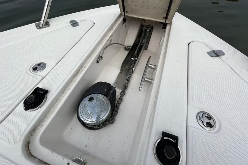  Yacht Photos Pics Anchor compartment of 2005 Regal Commodore 3560 boat with chain and winch.