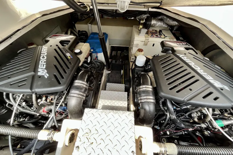  Yacht Photos Pics Engine compartment of 2005 Regal Commodore 3560 with dual Mercury engines.