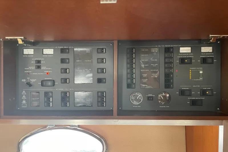  Yacht Photos Pics Electrical control panel of a 2008 Princess V53 yacht, featuring various switches and gauges.