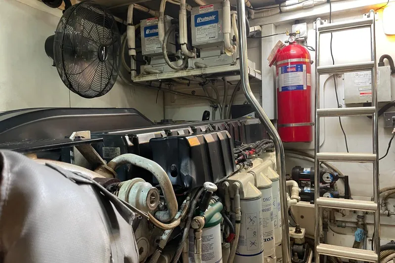  Yacht Photos Pics Engine room of 2008 Princess V53 yacht with machinery and safety equipment.