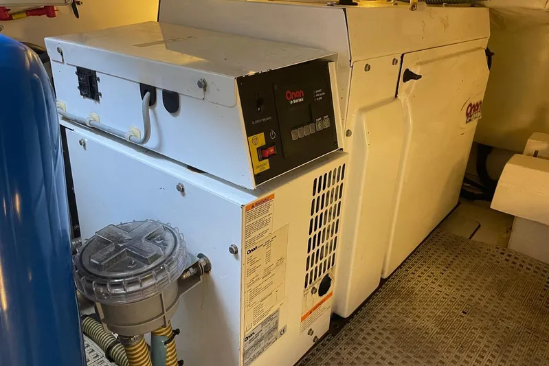  Yacht Photos Pics Engine room of a 2008 Princess V53 yacht featuring an Onan generator.