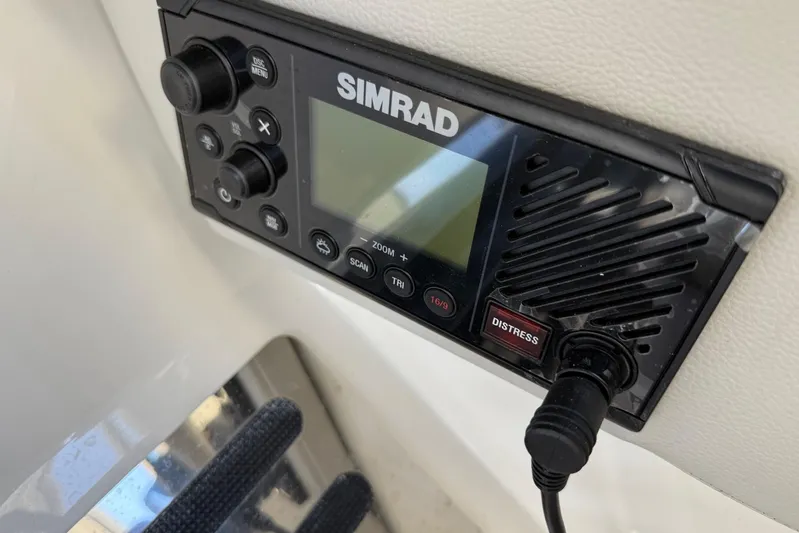  Yacht Photos Pics Simrad marine radio on 2021 Sea Ray SLX 310 boat dashboard.