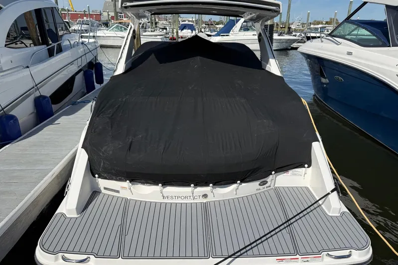  Yacht Photos Pics 2021 Sea Ray SLX 310 boat covered at marina dock.