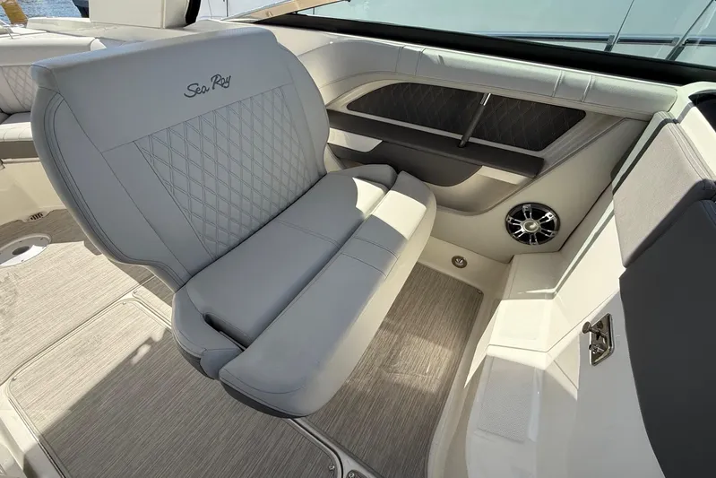  Yacht Photos Pics 2021 Sea Ray SLX 310 boat interior with luxurious seating and speaker system.