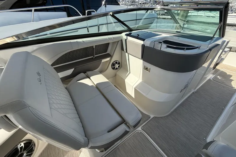  Yacht Photos Pics 2021 Sea Ray SLX 310 boat interior with luxurious seating and sleek design.