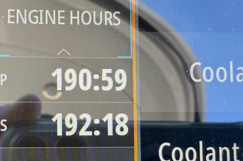  Yacht Photos Pics Display showing engine hours for 2021 Sea Ray SLX 310 boat.