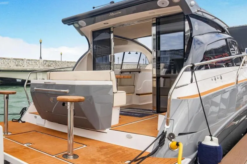 Custom Order Your 415 Today! Yacht Photos Pics Luxury Hanover 415 yacht docked, showcasing sleek design and powerful Mercury engines, 2025 model.