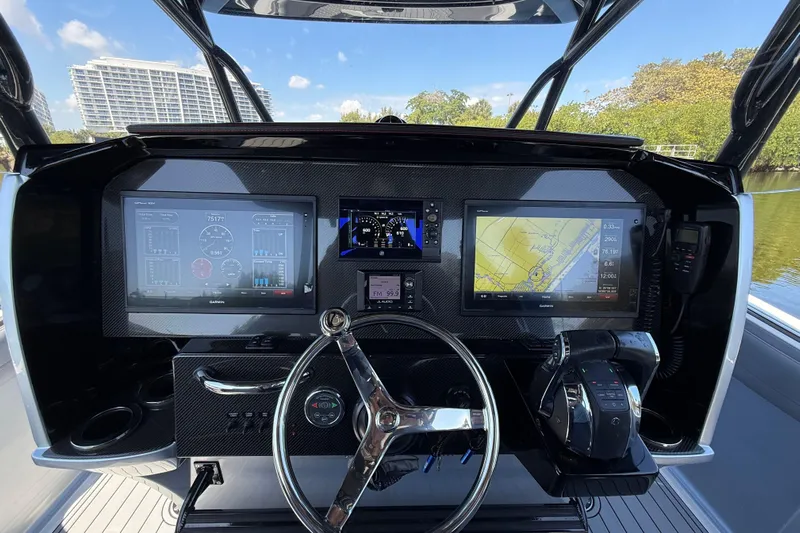  Yacht Photos Pics 2018 Nor-Tech 390 Sport Center Console dashboard with advanced navigation and control systems.