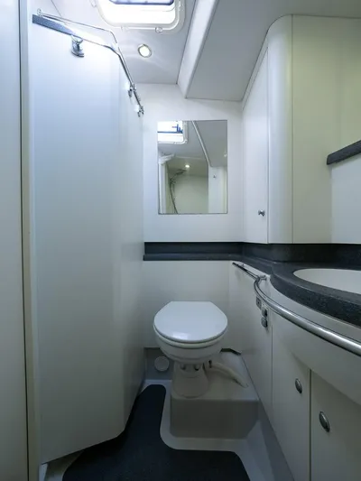 Gulliver Yacht Photos Pics Luxurious bathroom in 2009 Najad 570 yacht, featuring modern fixtures and sleek design.