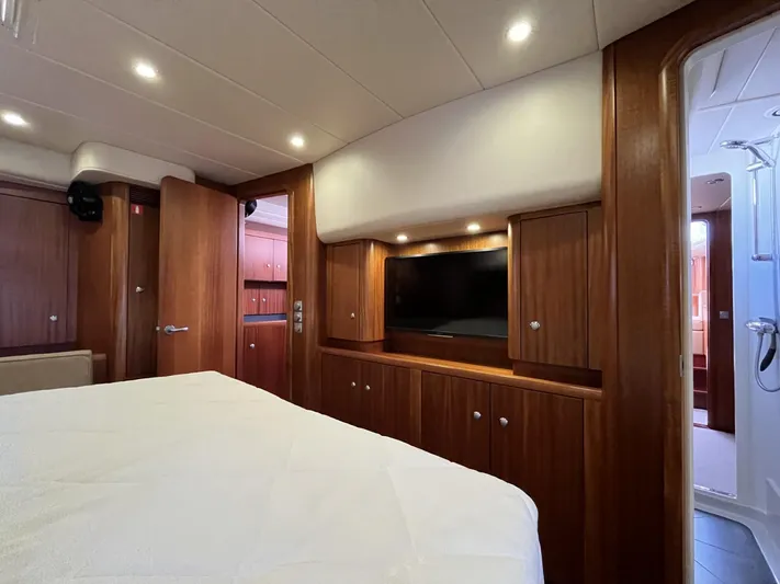 Gulliver Yacht Photos Pics Luxurious 2009 Najad 570 yacht interior with wood paneling and modern amenities.