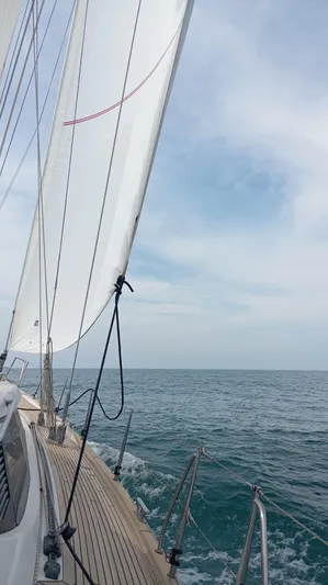 Gulliver Yacht Photos Pics Sailing on a 2009 Najad 570 yacht with clear skies and calm seas.