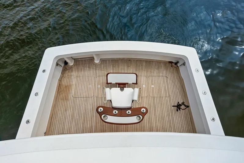 True Grit Yacht Photos Pics Viking 56 Convertible 2006 yacht deck with fishing chair, viewed from above.