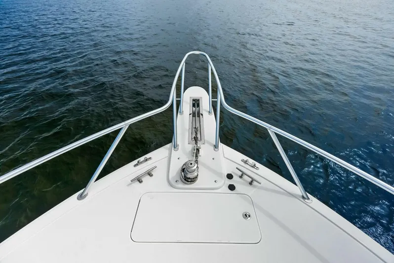 True Grit Yacht Photos Pics Bow view of 2006 Viking 56 Convertible yacht on open water.