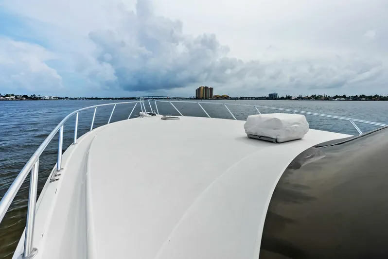 True Grit Yacht Photos Pics Bow view of 2006 Viking 56 Convertible yacht on open water.