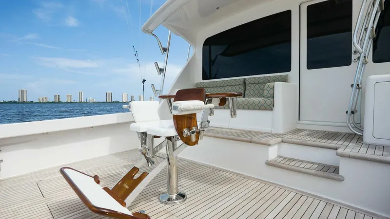 True Grit Yacht Photos Pics 2006 Viking 56 Convertible yacht deck with fishing chair and ocean view.