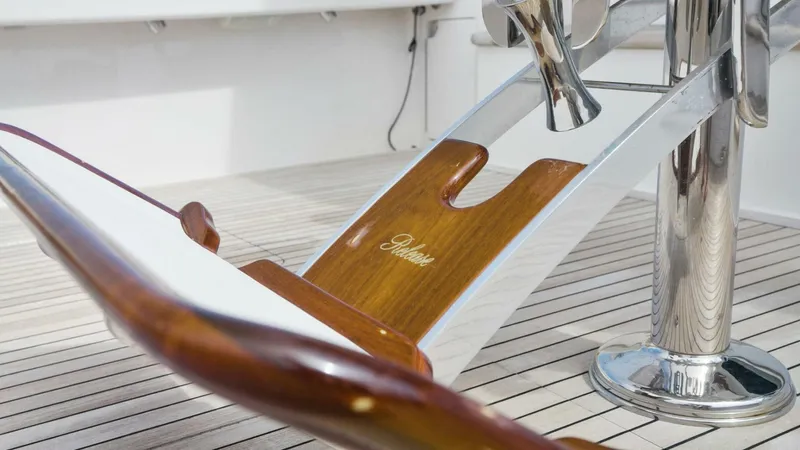 True Grit Yacht Photos Pics Viking 56 Convertible 2006 yacht deck with polished wood and metal details.