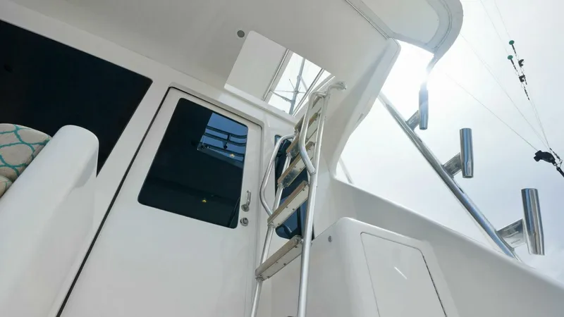 True Grit Yacht Photos Pics 2006 Viking 56 Convertible yacht interior with ladder and door.